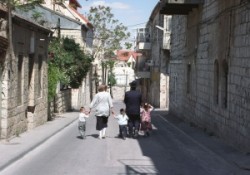 Ultraortodox Jews family. These a play Mea Shearim quarter in Jerusalem. Sabbat Shalom.