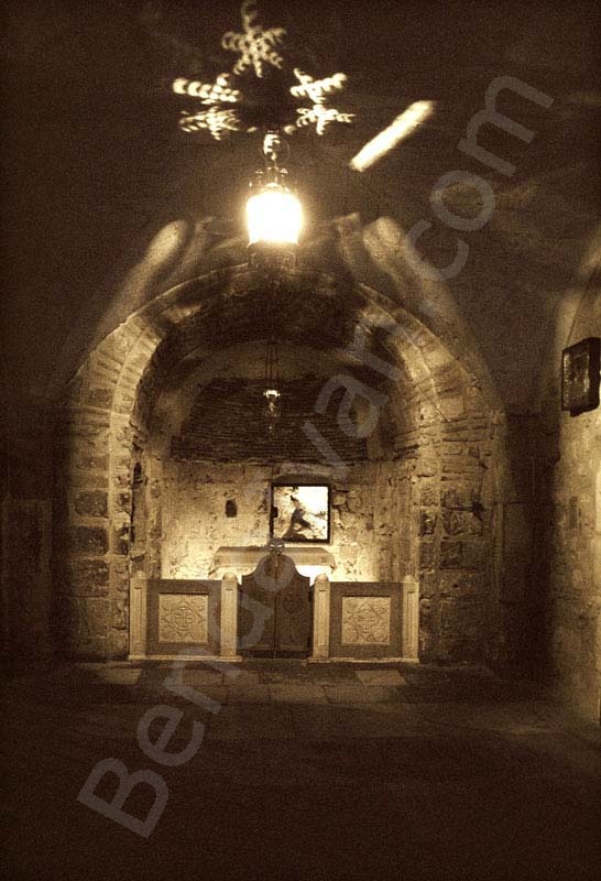 One can see the altar in the Chapel of Adam and the rock beneath the Golgotha. Church of the Holy Sepulchre is in Israel, Jerusalem old sity, Christian Quarter.
