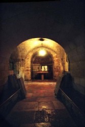 One can see the altar in the Chapel of Adam and the rock beneath the Golgotha. Adam’s  skull was buried here. When Jesus was crucified and his body was nailed, his blood was dripping down from the cro