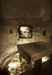 One can see the altar in the Chapel of Adam and the rock beneath the Golgotha. Adam’s  skull was buried here. When Jesus was crucified and his body was nailed, his blood was dripping down from the cro